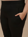 Close-up view of Plus Size Black Casual Pants showing elastic waistband and soft cotton-blend fabric