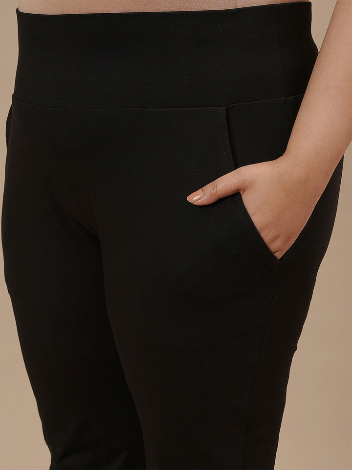 Close-up view of Plus Size Black Casual Pants showing elastic waistband and soft cotton-blend fabric