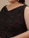 Close-up view of Plus Size Black Party Dress showing neckline and soft, stretch fabric detail