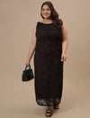 Plus-size woman in styled shoot wearing Plus Size Black Party Dress with body-hugging silhouette