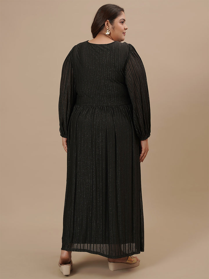 Plus-size woman in back view wearing Plus Size Long Black Dress with fitted waist and flowing skirt