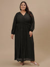 Plus-size woman in front view wearing Plus Size Long Black Dress with V-neckline and gathered waist detail