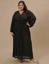 Plus-size woman standing straight wearing Plus Size Long Black Dress with full-length hem and structured bodice