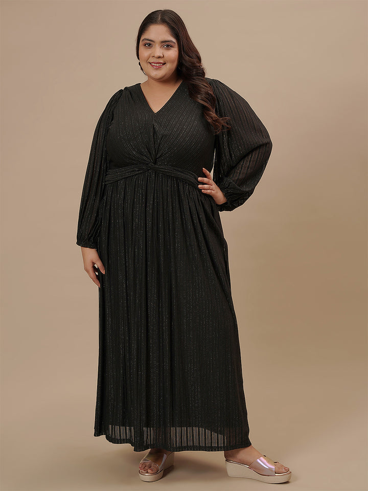 Plus-size woman standing straight wearing Plus Size Long Black Dress with full-length hem and structured bodice