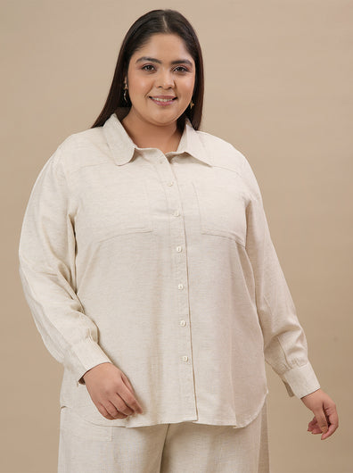 Plus-size woman in front look wearing Plus Size Long Linen Shirt in beige featuring long sleeves and straight cut