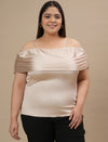 Plus-size woman in front view smiling while wearing Plus Size Off Shoulder Top with elastic neckline and flowy sleeves
