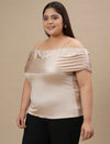 Plus-size woman in left side view wearing Plus Size Off Shoulder Top with flared sleeves and casual drape