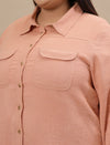 Close-up view of Plus Size Orange Cotton Top showing front button detail and soft cotton texture