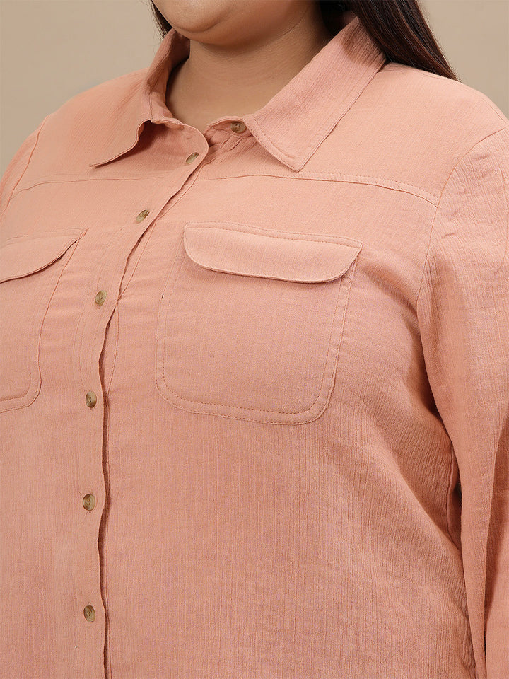 Close-up view of Plus Size Orange Cotton Top showing front button detail and soft cotton texture