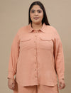 Plus-size woman in front view wearing Plus Size Orange Cotton Top with button-down front and short sleeves