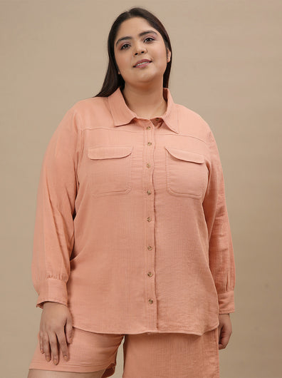 Plus-size woman in front pose wearing Plus Size Orange Cotton Top featuring breathable cotton fabric and relaxed fit