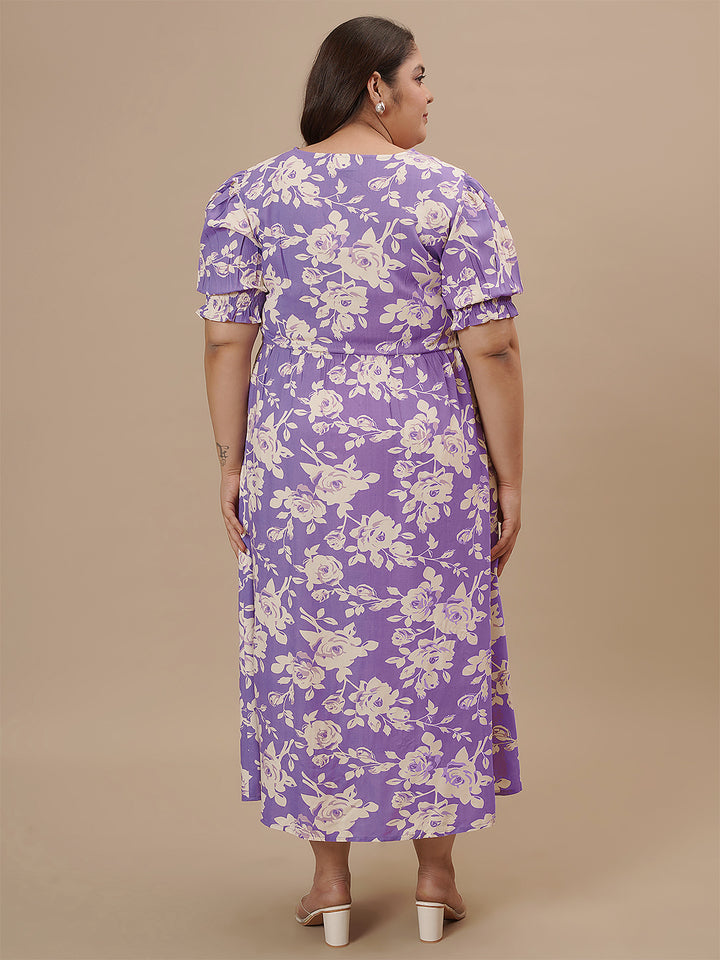 Plus-size woman in back view wearing Plus Size Puff Sleeve Dress with smocked back and flared skirt