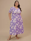 Plus-size woman smiling in front view wearing Plus Size Puff Sleeve Dress with puff sleeves and A-line silhouette
