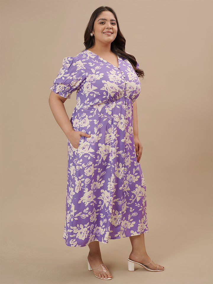 Plus-size woman in side view wearing Plus Size Puff Sleeve Dress with short puff sleeves and flowing fit