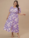 Plus-size woman twirling in Plus Size Puff Sleeve Dress with flared skirt and statement sleeves