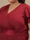 Close-up view of Plus Size Red Satin Gown showing satin texture and neckline detail