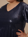 Close-up view of Plus Size Sequin Blue Dress showing shimmer detail and rounded neckline