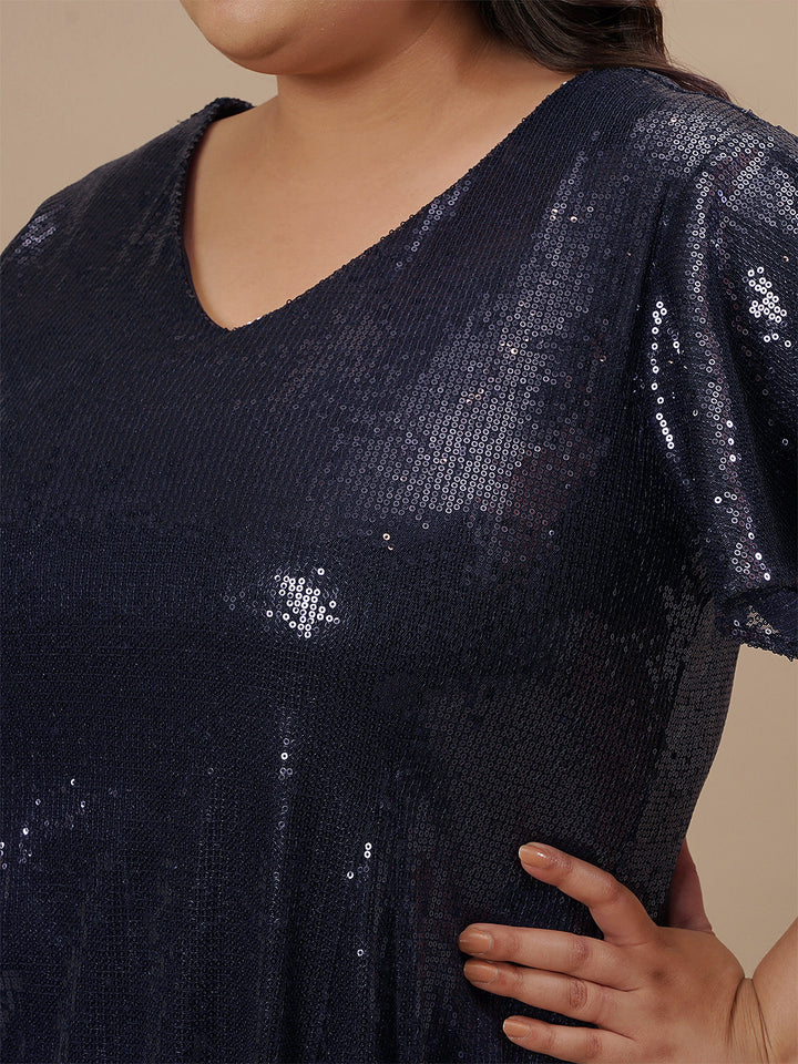 Close-up view of Plus Size Sequin Blue Dress showing shimmer detail and rounded neckline