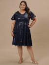Plus-size woman standing straight in Plus Size Sequin Blue Dress featuring sleek fit and shimmering sequins