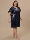 Plus-size woman walking in Plus Size Sequin Blue Dress with sleeveless design and sparkling blue sequins
