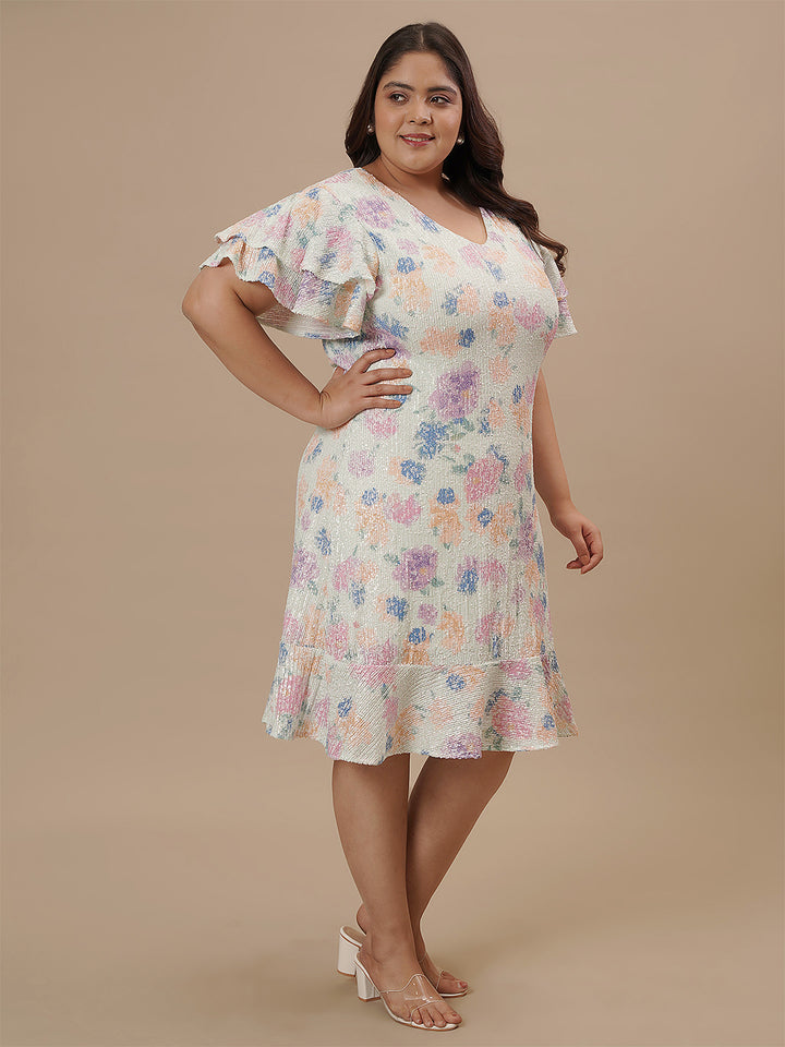 Plus-size woman in front right angle view wearing Plus Size Sequin Sheath Dress with shimmering sequin finish