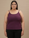 Plus-size woman in front view wearing Purple Plus Size Camisole featuring scoop neckline and relaxed fit