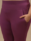 Close-up view of Purple Plus Size Leggings With Pockets showing wide waistband and stretch fabric