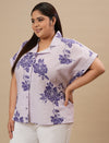 Plus-size woman in left side view wearing Purple Plus Size Linen Shirt with breathable linen fabric and casual cut