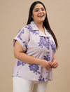 Plus-size woman in right side view wearing Purple Plus Size Linen Shirt with breathable fabric and casual silhouette
