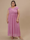 Plus-size woman standing in Purple Plus Size Off Shoulder Dress with flared hem and ruched bodice