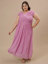 Plus-size woman walking forward in Purple Plus Size Off Shoulder Dress with off-shoulder sleeves and A-line shape