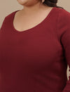 Close-up view of Red Plus Size Bodycon Maxi Dress showing stretch fabric and scoop neckline