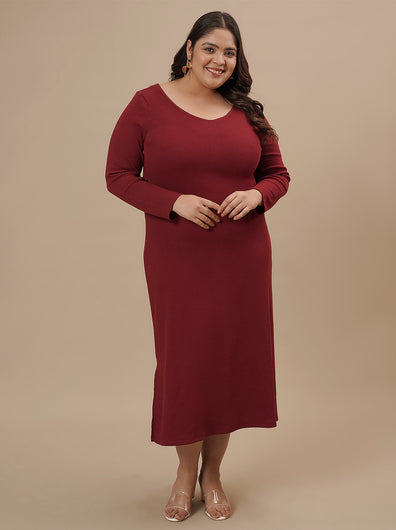 Plus-size woman in front pose wearing Red Plus Size Bodycon Maxi Dress with sleeveless cut and curve-hugging fit