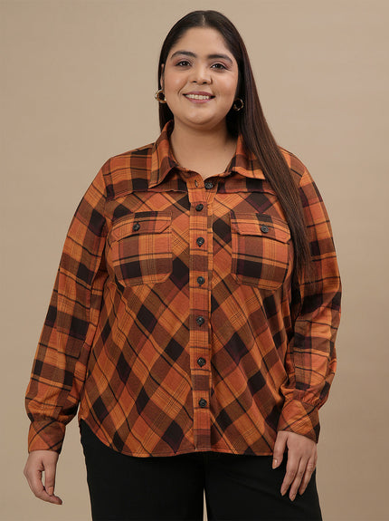 Plus-size woman in front view wearing Rust Brown Plus Size Shirt Jacket with long sleeves and chest pockets