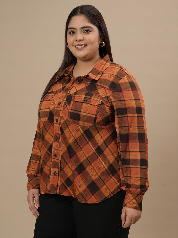Plus-size woman in left side view wearing Rust Brown Plus Size Shirt Jacket with button-down closure and relaxed fit