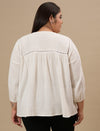 Plus-size woman in back view wearing White Cotton Plus Size Top with full sleeves and relaxed fit