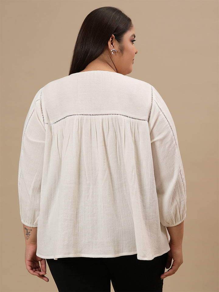 Plus-size woman in back view wearing White Cotton Plus Size Top with full sleeves and relaxed fit
