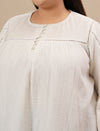 Close-up view of White Cotton Plus Size Top showing full sleeves and soft, breathable cotton fabric