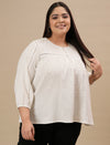 Plus-size woman in angled front view wearing White Cotton Plus Size Top with full sleeves and lightweight cotton fabric