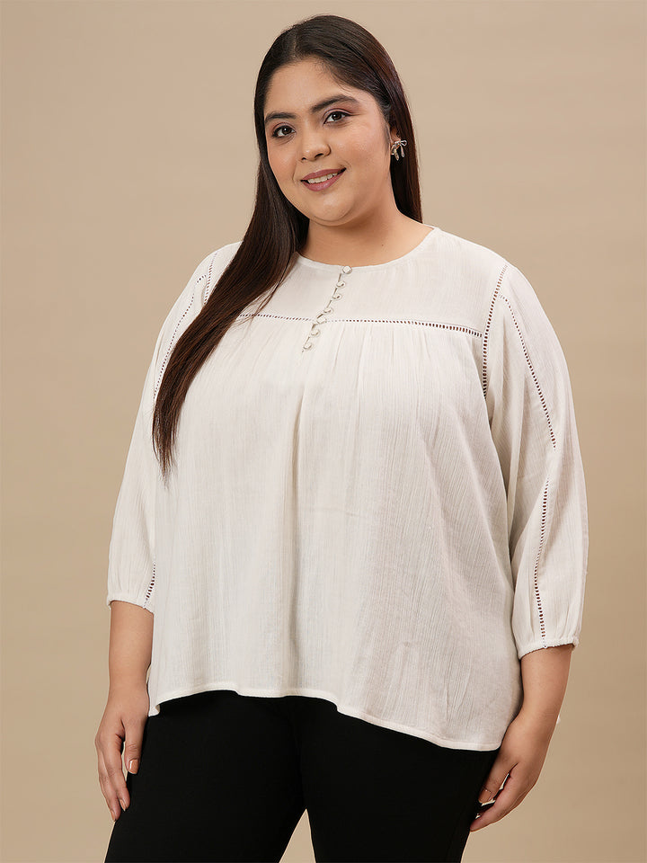 Plus-size woman in front-facing view wearing White Cotton Plus Size Top with full sleeves and breathable cotton fabric