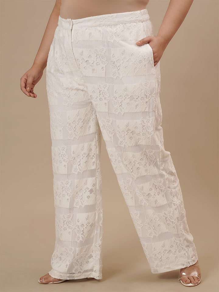 Plus-size woman in side angle view wearing White Lace Plus Size Co-Ord Set with delicate lace texture and relaxed silhouette