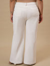 Plus-size woman in back view wearing White Plus Size Bootcut Jeans with classic pockets and bootcut fit