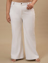 Plus-size woman in angled front view wearing White Plus Size Bootcut Jeans with structured fit and flared leg design