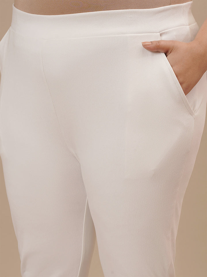Close-up view of White Plus Size Jeggings showing waistband detail and soft stretch fabric