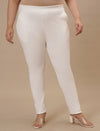Plus-size woman in front view wearing White Plus Size Jeggings with high-rise waist and sleek stretch fit