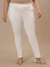 Plus-size woman in front view wearing White Plus Size Jeggings with high-rise waist and sleek stretch fit