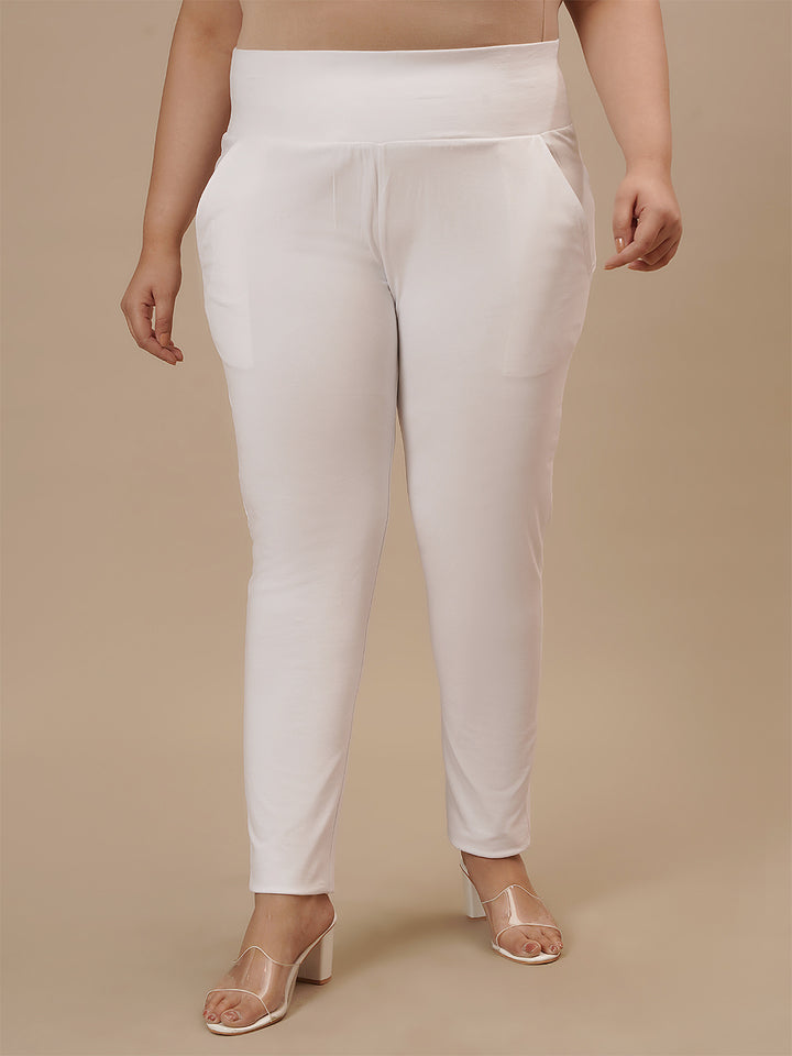 Plus-size woman in front view wearing White Plus Size Leggings With Pockets with clean silhouette and high-rise design