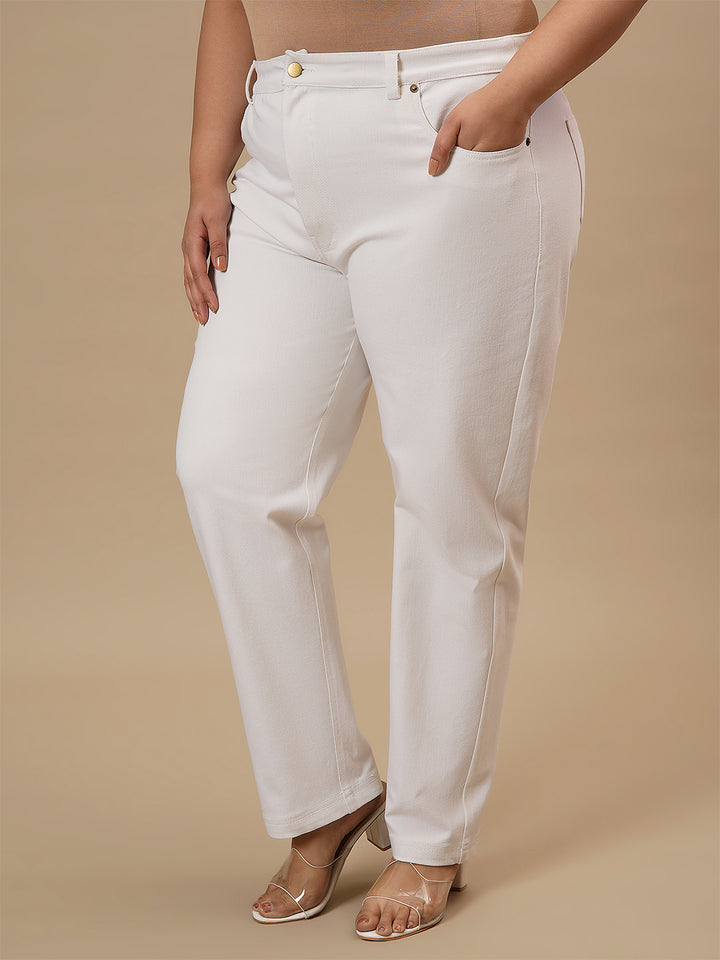Plus-size woman in left side view wearing White Plus Size Straight Fit Jeans with mid-rise waist and straight leg design