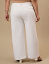 Plus-size woman in back view wearing White Plus Size Wide Leg Jeans with clean finish and wide-leg design