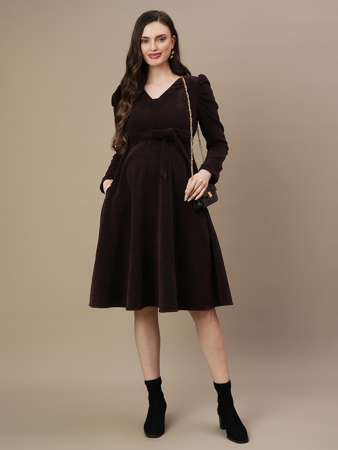 woolen midi dress Welcome winters with our new launch in Woolen midi dress have abstract print and signature round neckline Stay warm and stylish this winter with our exquisite woolen knitted dress. It is soft,